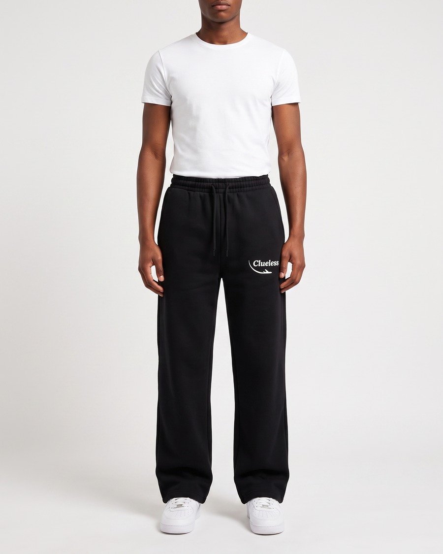Clueless jogger in black, script and aircraft mark on the thigh, view 2