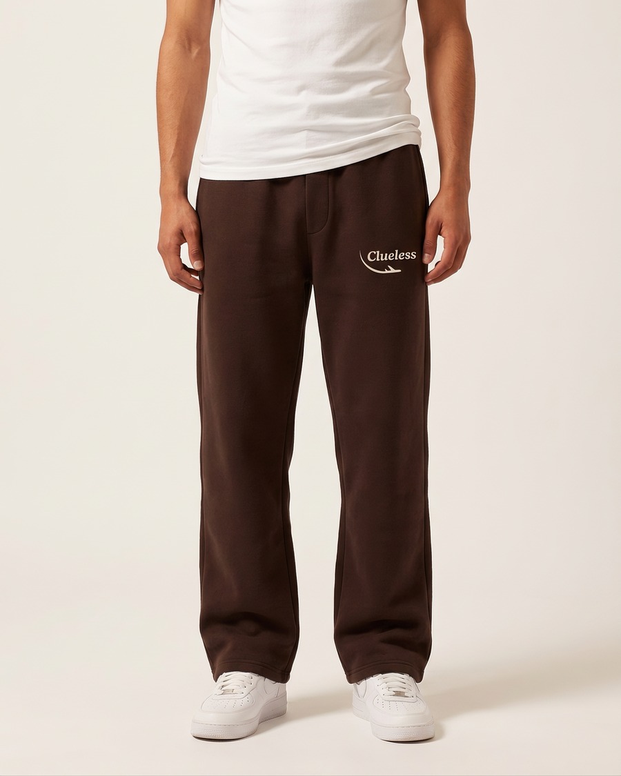 Clueless jogger in brown, script and aircraft mark on the thigh, view 1