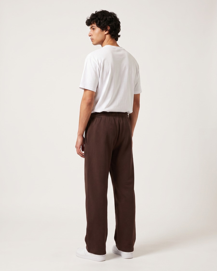 Clueless jogger in brown, script and aircraft mark on the thigh, view 4