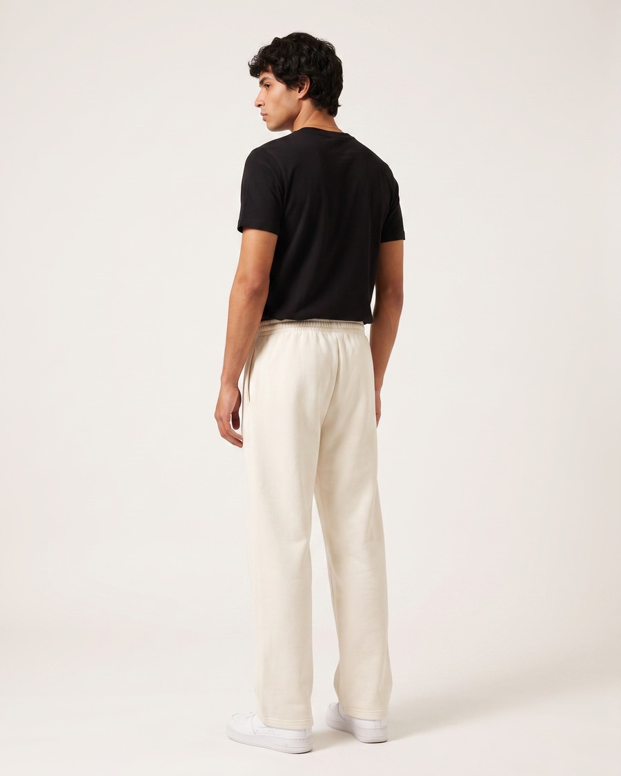 Clueless jogger in cream, script and aircraft mark on the thigh, view 4